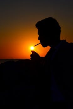 Silhouette of Man with Cigarette